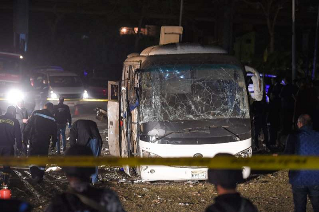 this picture taken on december 28 2018 shows the scene of an attack on a tourist bus near the giza pyramids outside cairo photo afp this picture taken on december 28 2018 shows the scene of an attack on a tourist bus near the giza pyramids outside cairo photo afp