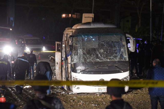 this picture taken on december 28 2018 shows the scene of an attack on a tourist bus near the giza pyramids outside cairo photo afp