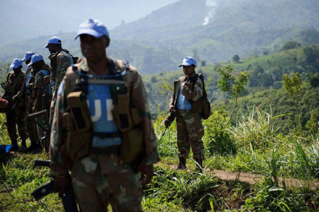 south african peacekeepers from the united nations organization stabilisation mission in congo monusco standing on a hillside position above the village of remek in masisi territory of the democratic republic of the congo 039 s north kivu province in 2012 photo afp south african peacekeepers from the united nations organization stabilisation mission in congo monusco standing on a hillside position above the village of remek in masisi territory of the democratic republic of the congo 039 s north kivu province in 2012 photo afp
