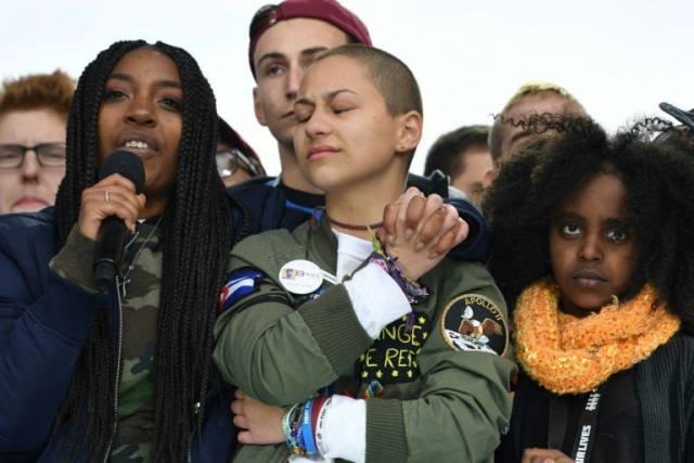 emma gonzalez c a student at marjory stoneman douglas high school at the quot march for our lives quot protest photo afp emma gonzalez c a student at marjory stoneman douglas high school at the quot march for our lives quot protest photo afp