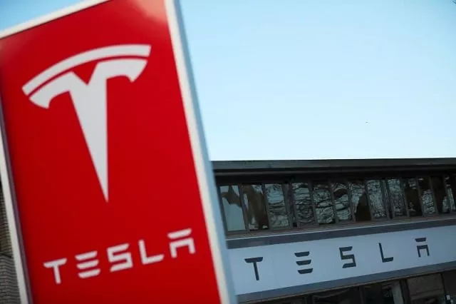 a tesla dealership is seen in west drayton just outside london britain february 7 2018 photo reuters a tesla dealership is seen in west drayton just outside london britain february 7 2018 photo reuters