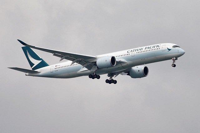 a cathay pacific airways airbus a350 900 airplane approaches to land at changi international airport in singapore june 10 2018 photo reuters