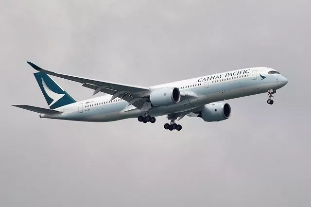 a cathay pacific airways airbus a350 900 airplane approaches to land at changi international airport in singapore june 10 2018 photo reuters a cathay pacific airways airbus a350 900 airplane approaches to land at changi international airport in singapore june 10 2018 photo reuters