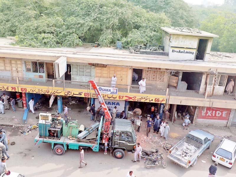 shopkeepers vacate their establishments a day ahead of the planned demolition of shops on the zoo s property photo online