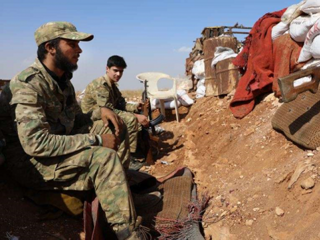 syrian opposition fighters from the national liberation front in idlib province photo afp syrian opposition fighters from the national liberation front in idlib province photo afp