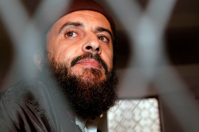 yemeni islamic militant jamal al badawi looks from behind bars during the first hearing of a sana 039 a court of appeals hearing in yemen december 8 2004 photo reuters yemeni islamic militant jamal al badawi looks from behind bars during the first hearing of a sana 039 a court of appeals hearing in yemen december 8 2004 photo reuters
