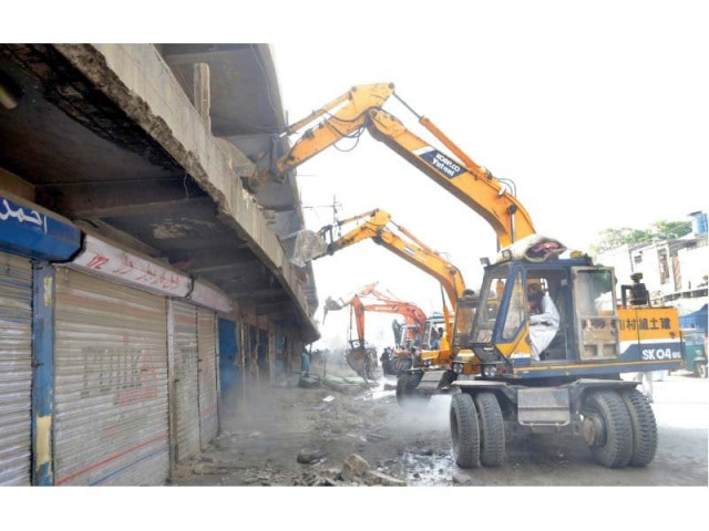 demolishment continues along the boundary wall of the zoological garden as part of the anti encroachment operation under the supervision of kmc photo ppi demolishment continues along the boundary wall of the zoological garden as part of the anti encroachment operation under the supervision of kmc photo ppi
