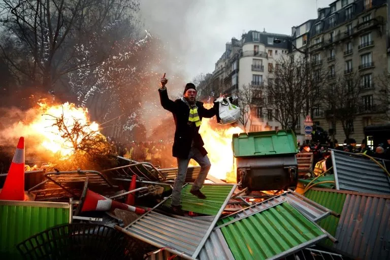 in paris yellow vest protesters set up burning barricades as they took to the streets for another saturday protest against macron 039 s pro market policies photo afp in paris yellow vest protesters set up burning barricades as they took to the streets for another saturday protest against macron 039 s pro market policies photo afp