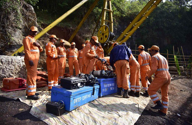 indian navy and ndrf personnel went inside a 370 foot deep mine where 15 miners are trapped to ascertain the water level inside photo afp