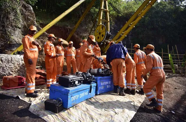indian navy and ndrf personnel went inside a 370 foot deep mine where 15 miners are trapped to ascertain the water level inside photo afp indian navy and ndrf personnel went inside a 370 foot deep mine where 15 miners are trapped to ascertain the water level inside photo afp