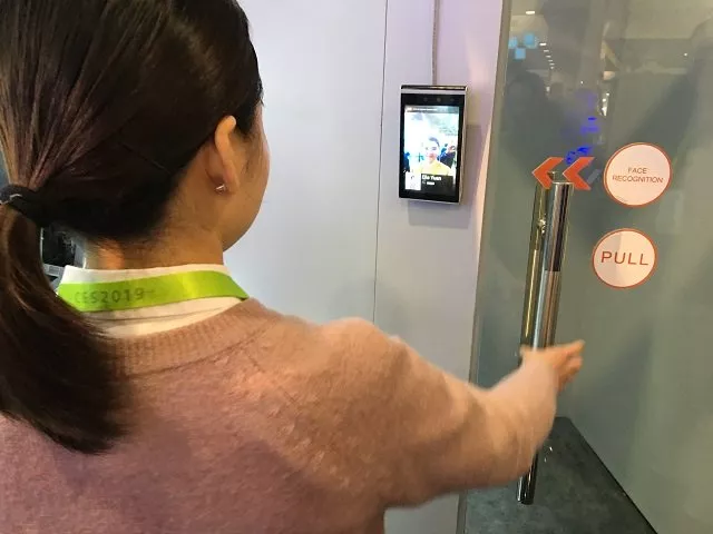 ella yuan of the chinese startup tuya shows how facial recognition can be used in a home security system to allow or deny entry at the consumer electronics show in las vegas on january 9 2019 photo afp ella yuan of the chinese startup tuya shows how facial recognition can be used in a home security system to allow or deny entry at the consumer electronics show in las vegas on january 9 2019 photo afp