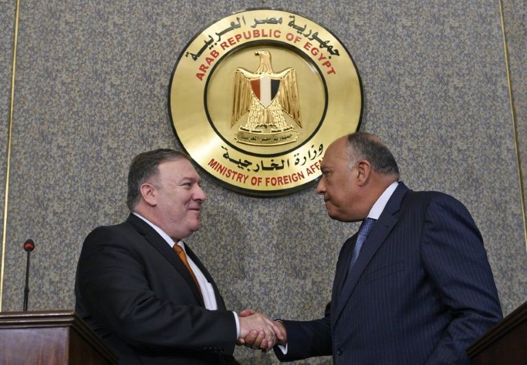us secretary of state mike pompeo shakes hands after holding a press conference with egyptian foreign minister sameh shoukry at the ministry of foreign affairs in cairo photo afp
