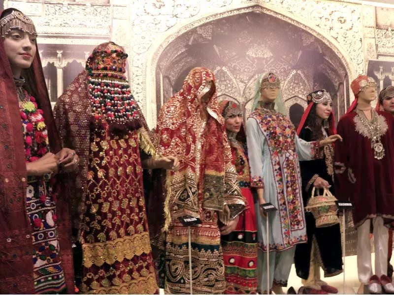 models pose at a display of wedding dresses from various regions of pakistan at lok virsa photo express models pose at a display of wedding dresses from various regions of pakistan at lok virsa photo express