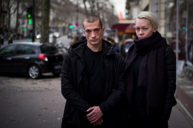 pyotr pavlensky left and his former partner oksana shalygina in paris in january 2017 photo afp pyotr pavlensky left and his former partner oksana shalygina in paris in january 2017 photo afp
