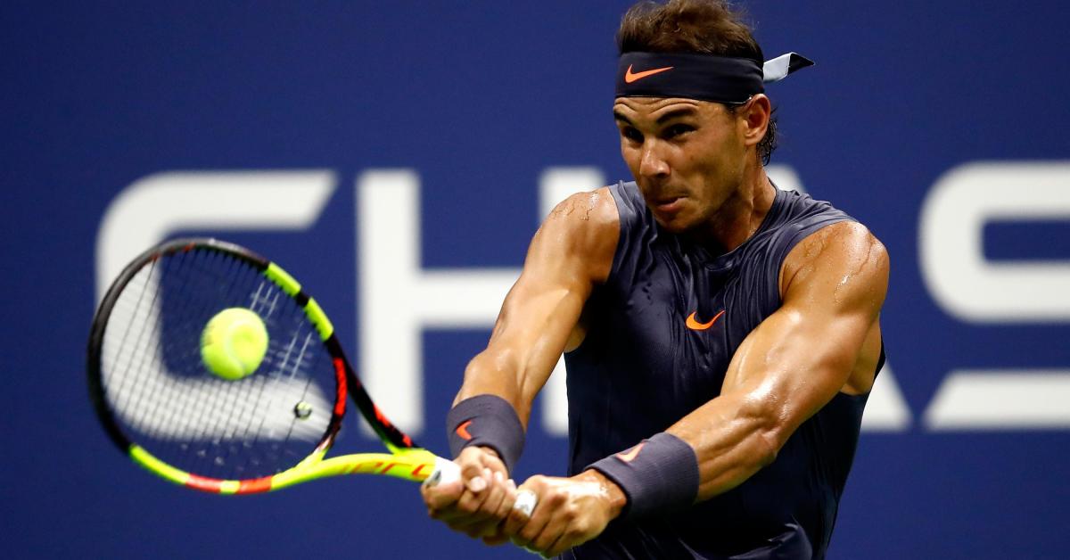 nadal pulled out of a brisbane warm up event with a slight thigh strain but declared saturday his troubles were behind him photo afp