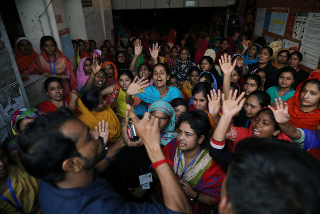 the garment workers shout as they protest for higher wages in dhaka bangladesh reuters mohammad ponir hossain the garment workers shout as they protest for higher wages in dhaka bangladesh reuters mohammad ponir hossain