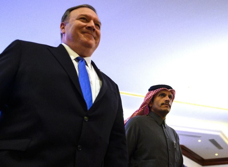 us secretary of state mike pompeo and qatari foreign minister mohammed bin abdulrahman al thani arrive for a joint press conference in doha qatar photo afp