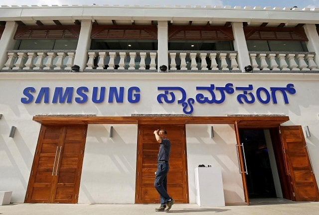 a man walks past a newly opened samsung store in bengaluru india september 11 2018 photo reuters a man walks past a newly opened samsung store in bengaluru india september 11 2018 photo reuters