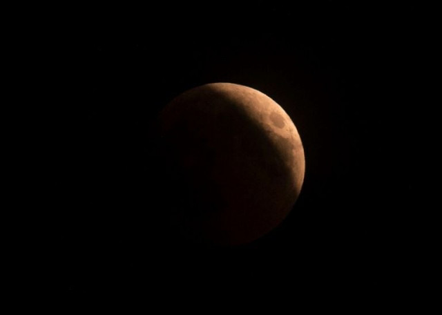 the total eclipse will last about an hour during which the moon will still be visible but in a shade of red photo afp the total eclipse will last about an hour during which the moon will still be visible but in a shade of red photo afp