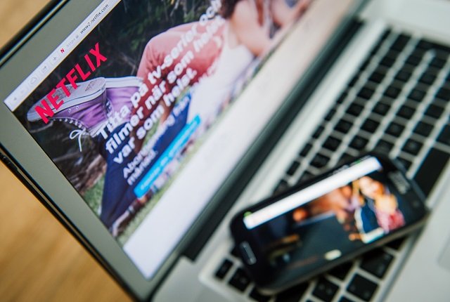 this picture taken on september 11 2014 shows the on demand internet streaming media provider netflix on a laptop screen and on a smartphone in stockholm photo afp