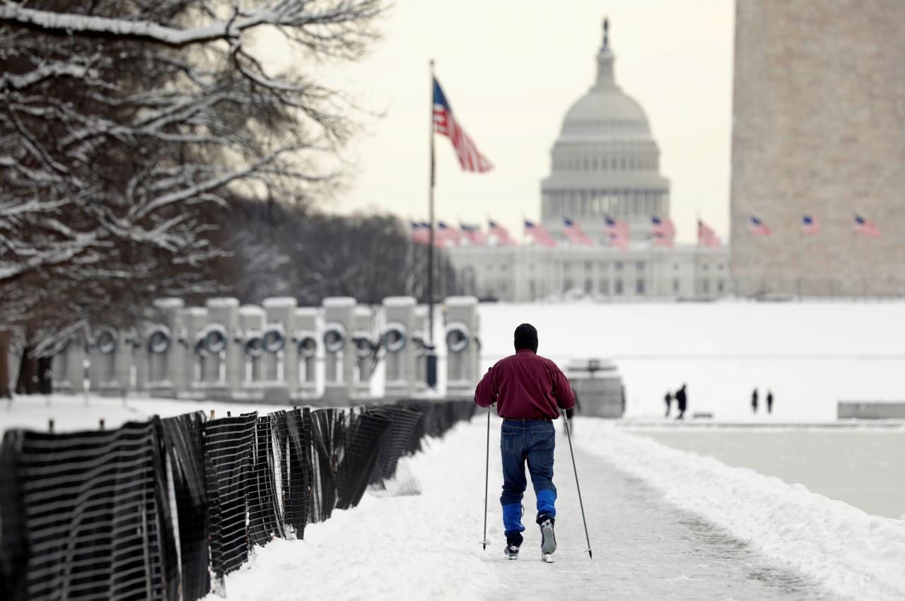 a skier makes his way toward the us capitol on day 24 of the government shutdown in washington dc us photo afp