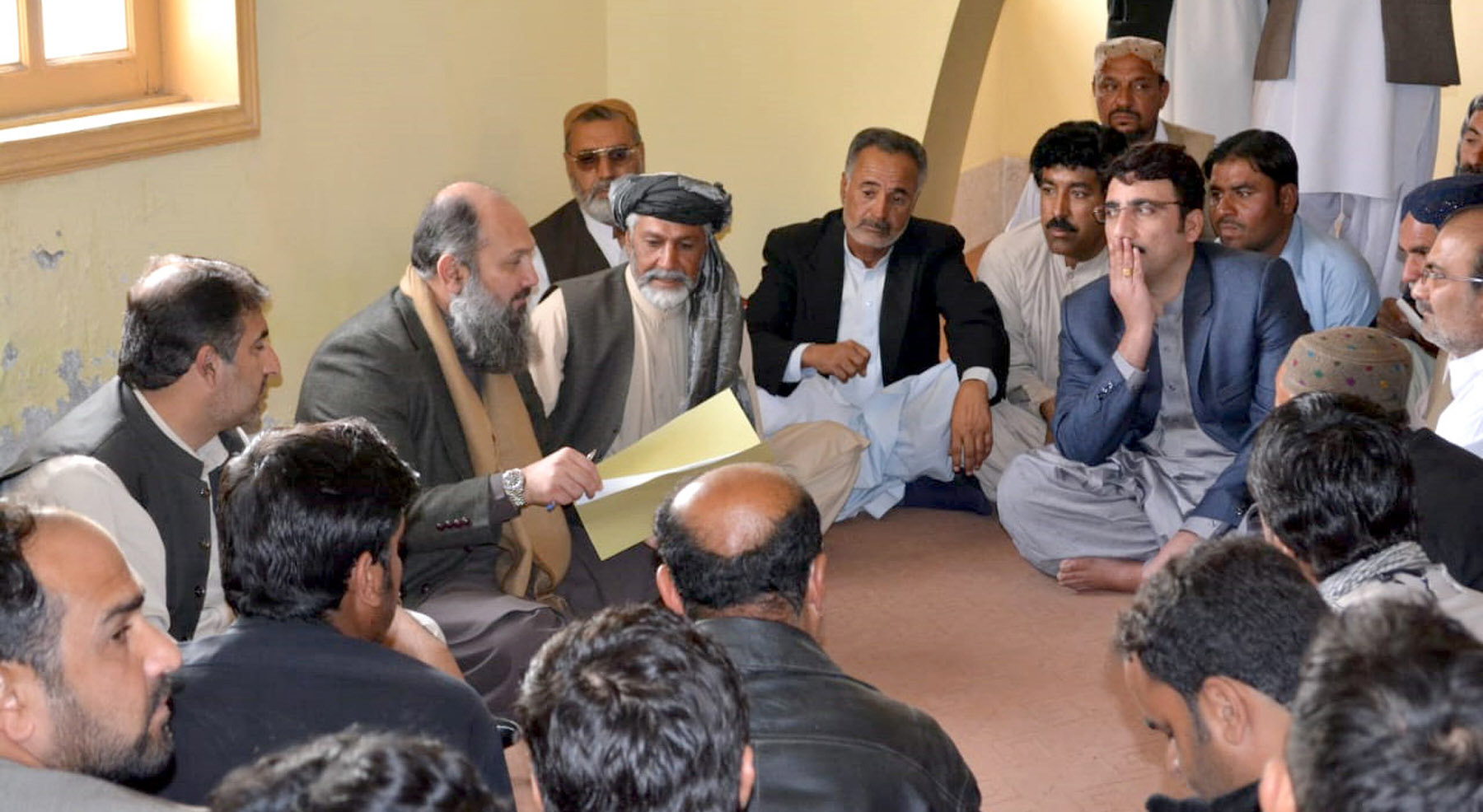 balochistan chief minister jam kamal khan interacts with the people of dalbandin at the finance minister 039 s house photo express