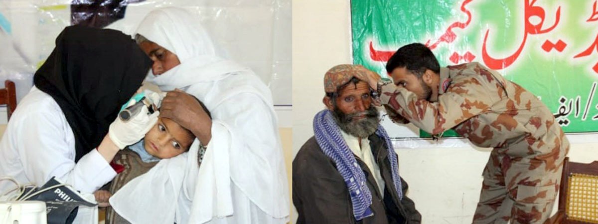 a frontier corps doctor treats a patient at the medical camp photo express