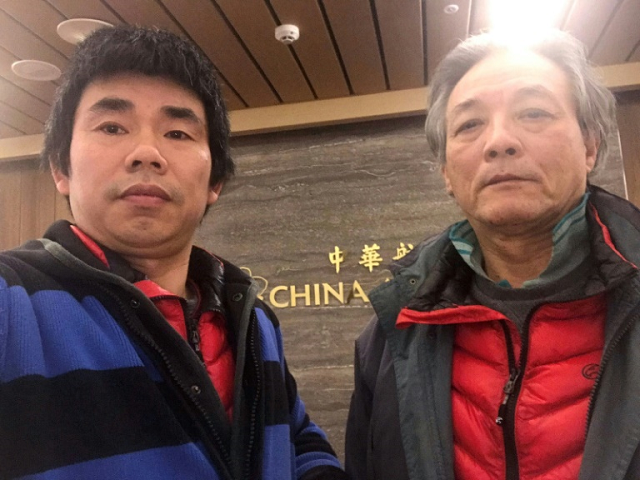 liu xinglian r and yan kefen chinese dissidents trapped in limbo at taiwan 039 s taoyuan airport have applied for asylum in canada photo afp