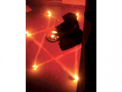 witch performs genital mutilation on three year old girl