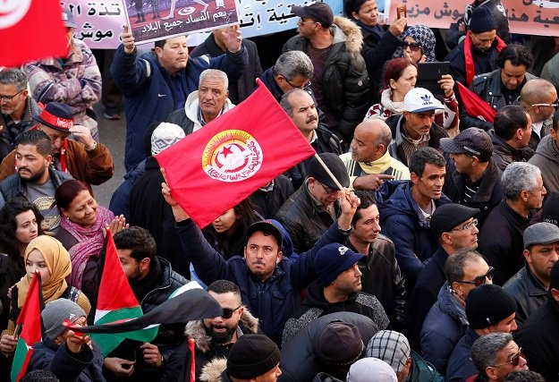 people gather during a nationwide strike against the government 039 s refusal to raise wages in tunis tunisia january 17 2019 photo reuters