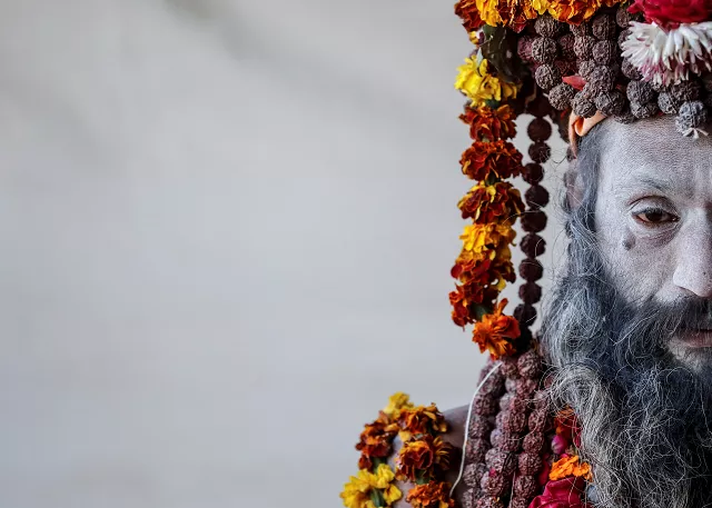 a naga sadhu or hindu holy man waits for devotees inside his camp during quot kumbh mela quot or the pitcher festival in prayagraj previously known as allahabad india january 17 2019 photo reuters