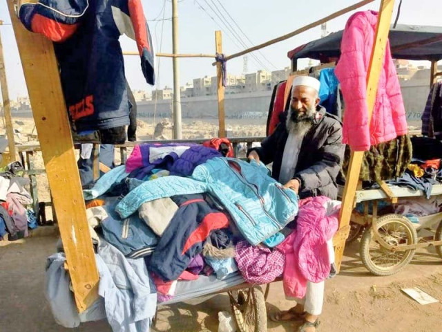 a displaced vendor of lighthouse takes a make shift stall to roads and intersections photo express a displaced vendor of lighthouse takes a make shift stall to roads and intersections photo express