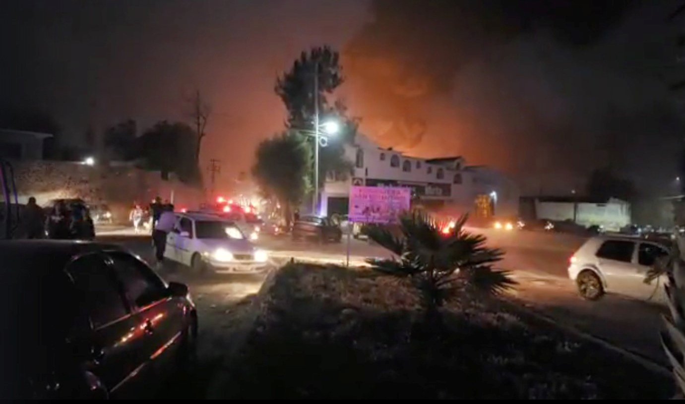 people react at the scene where a ruptured fuel pipeline exploded in the municipality of tlahuelilpan hidalgo mexico near the tula refinery of state oil firm petroleos mexicanos pemex january 18 2019 in this still image taken from a video obtained from social media photo reuters