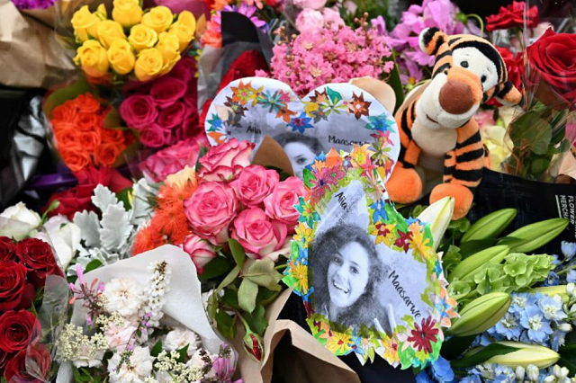 this picture shows flowers during a vigil in memory of murdered israeli student aiia maasarwe in melbourne on january 18 2019 photo afp