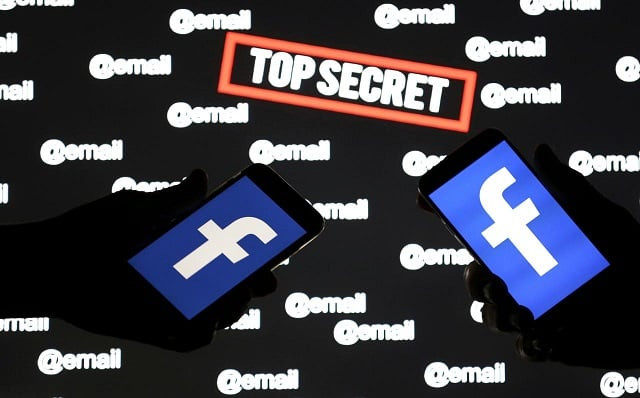 persons hold smartphones with the facebook logo in front of displayed quot top secret quot and quot email quot words in this picture illustration taken december 6 2018 photo reuters persons hold smartphones with the facebook logo in front of displayed quot top secret quot and quot email quot words in this picture illustration taken december 6 2018 photo reuters