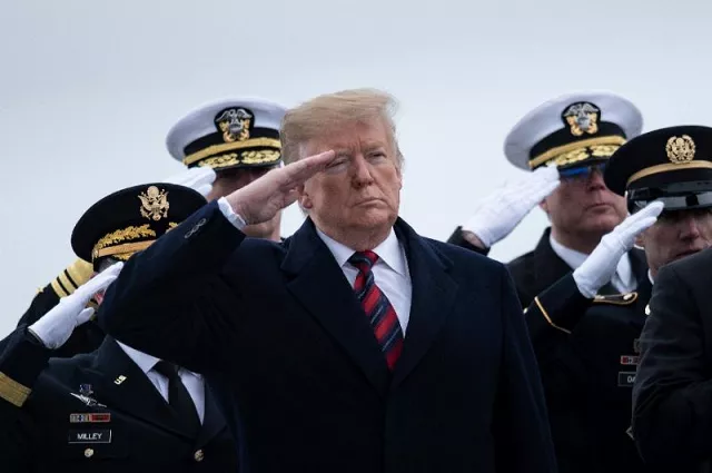us president donald trump and others pay their respects as the remains of scott wirtz a defense intelligence agency civilian and former navy seal are carried past during a ceremony at dover air force base photo afp us president donald trump and others pay their respects as the remains of scott wirtz a defense intelligence agency civilian and former navy seal are carried past during a ceremony at dover air force base photo afp