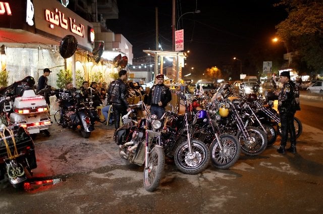 members of the iraq bikers the first iraqi biker group gather outside a cafe in baghdad iraq photo reuters