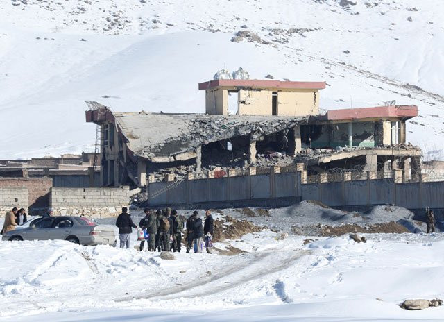 afghan men stand in front of a collapsed building of a military base after a car bomb attack in maidan wardak afghanistan january 21 2019 photo reuters afghan men stand in front of a collapsed building of a military base after a car bomb attack in maidan wardak afghanistan january 21 2019 photo reuters