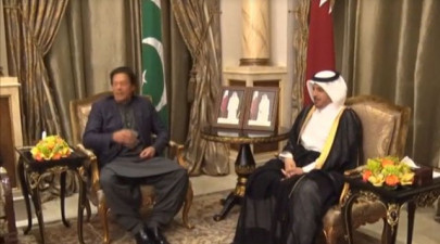 pm meets qatari counterpart in doha