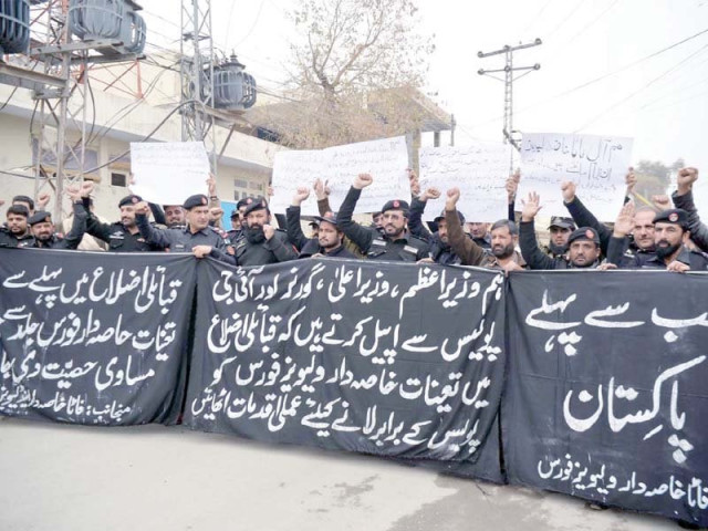 representatives of khasadar force and levies protest in support of their demands outside peshawar press club on monday photo ppi representatives of khasadar force and levies protest in support of their demands outside peshawar press club on monday photo ppi