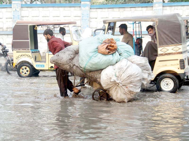 karachiites struggled to traverse overflowing roads on monday after the first downpour of the winter season photos online