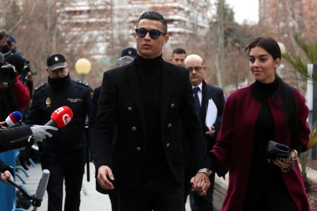 his court appearance lasted about 15 minutes as the five times world footballer of the year only needed to sign off on the previously settled agreement photo afp