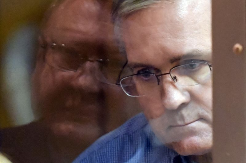 former us marine paul whelan appeared in a glass cage at the court hearing as is usual for suspects in russia photo afp
