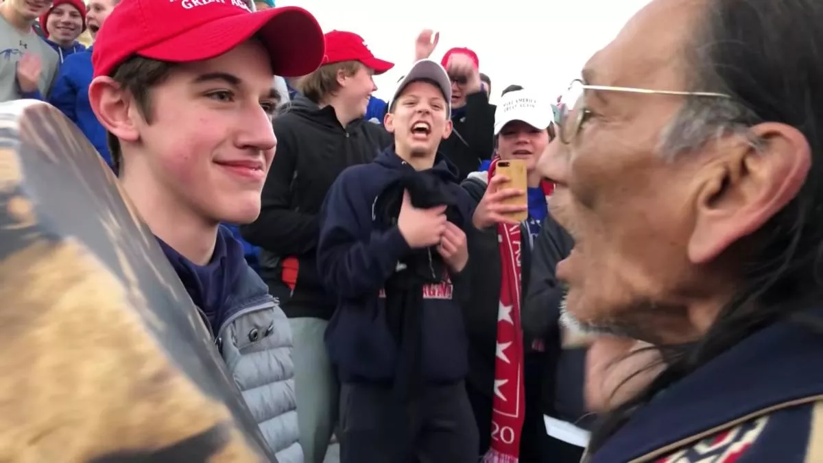 a student from covington catholic high school stands in front of native american vietnam veteran nathan phillips in washington us in this still image photo reuters a student from covington catholic high school stands in front of native american vietnam veteran nathan phillips in washington us in this still image photo reuters