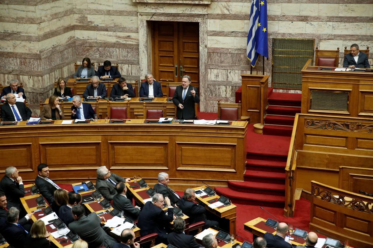 greek alternate minister of foreign affairs george katrougalos addresses lawmakers during a parliamentary session on a name change agreement with neighbouring macedonia in athens greece photo reuters