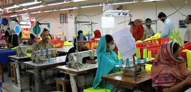 workers in pakistan s garment industry face abuse hrw