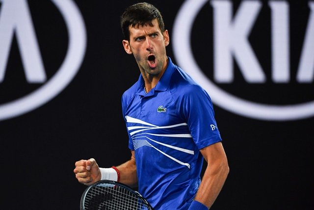 serbia 039 s novak djokovic reacts after a point against france 039 s lucas pouille during their men 039 s singles semi final match on day 12 of the australian open tennis tournament in melbourne photo afp