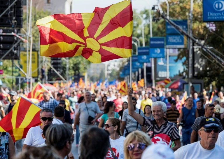people wave macedonian flags at a quot yes quot campaign rally in skopje ahead of the referendum on whether to change the country 039 s name to quot republic of northern macedonia quot photo afp