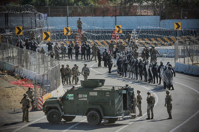 us troops pictured in november 2018 at the san ysidro border crossing where 20 central american asylum seekers a day are expected to be returned by the us photo afp