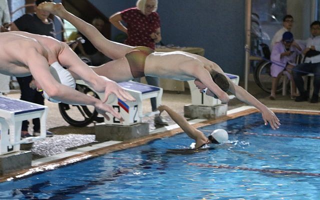 swimmers at the 2018 israel paralympic winter swim championships held at the alyn pool in haifa photo courtesy thetimespofisrael